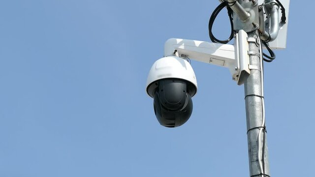 Public Surveillance CCTV Security Camera Scanning and Monitoring the Area