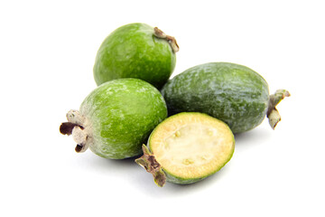 Feijoa fruit or whole and half pineapple guava isolated on white