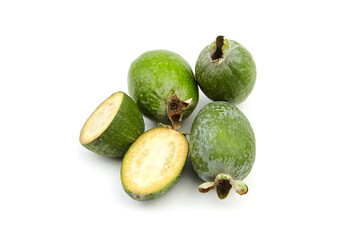 Feijoa fruit or whole and half pineapple guava isolated on white