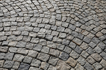 Cobbled stone road surface