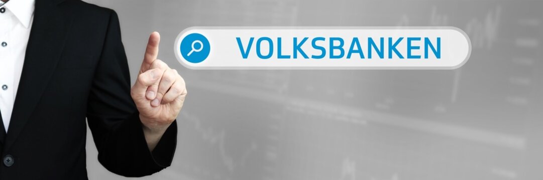 Volksbanken. Mann zeigt mit Finger auf Suchfeld im Internet-Browser. Wort/Text (blau) in der Suche.