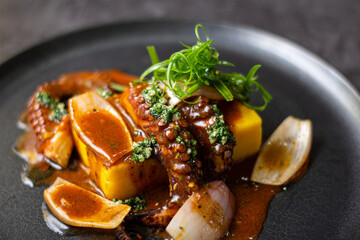 Causa Limeña, accompanied by juicy octopus, corn and sweet potato.
