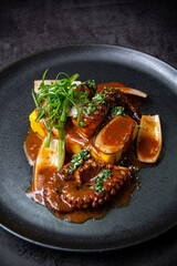 Causa Limeña, accompanied by juicy octopus, corn and sweet potato.
