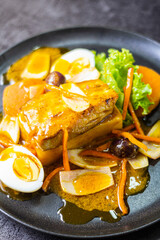Causa + fried fish + boiled egg accompanied by stewed sarsa
