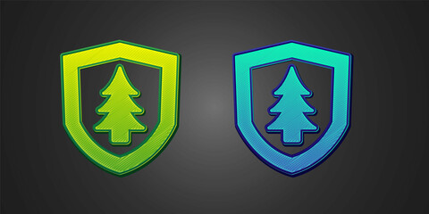 Green and blue Shield with tree icon isolated on black background. Eco-friendly security shield with tree. Vector