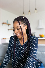 Portrait young black woman smiling happy braids
