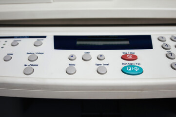 Fototapeta premium Close-up of fax buttons keypad for dialing modern - vintage copy scanner fax machine with focus on the Copy Features buttons set Start Copy, Fax, Clear, Send, Menu, Copies buttons