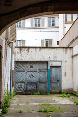 Vintage garage inscription on the old rusty door in central Strasbourg, France