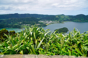 green and blue lake in cidade on the azores islands