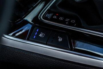 Plakat Seat heating controller buttons close up view. Car interior. Seat heater button, car interior.