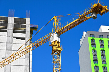 Crane and highrise construction site