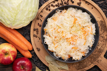 Sauerkraut, fermented cabbage on a plate, healthy probiotic food