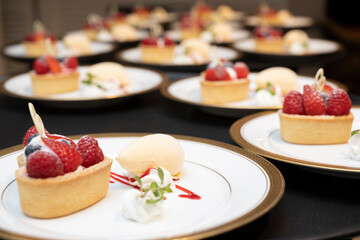 Strawberry tart and vanilla ice cream plate