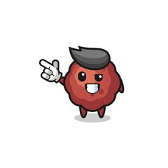 meatball mascot pointing top left