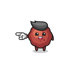 meatball cartoon with pointing left gesture