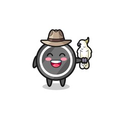 hockey puck zookeeper mascot with a parrot