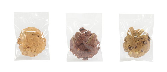 Homemade cookie in plastic bag package isolated on white.