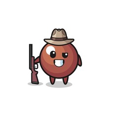 Obraz premium chocolate ball hunter mascot holding a gun