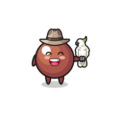 Naklejka premium chocolate ball zookeeper mascot with a parrot