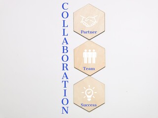 Collaboration concept with icons on wooden hexagon against white background.