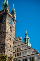 Naklejka premium The historical black tower in Klatovy next to the city administration