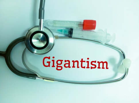 Gigantism (excessive growth and height due to overproduction growth hormone in childhood) text isolated with medical equipment's