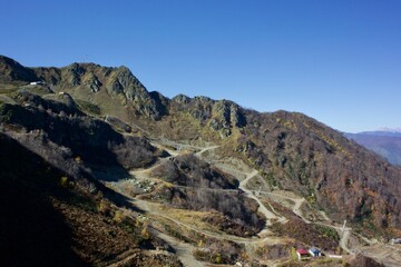 Beautiful landscapes of mountain ranges of the Caucasus Mountains in the Krasnaya Polyana region of Sochi, Russia