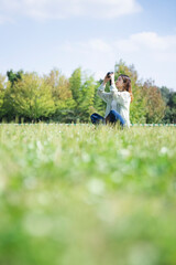 公園のカメラ女子