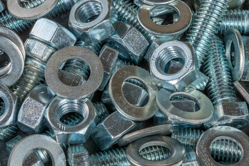 Bolts, washers and nuts close-up. Fasteners. Details for repair.