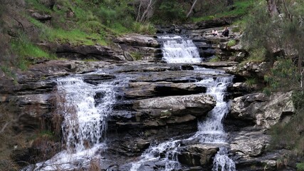 a waterfall splitting into two