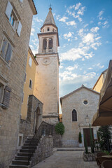 Belfry of Saint John Church symbol of Budva. Church Saint John, with images and icons of Venetian one of most famous churches in Budva. Budva, Montenegro, Europe.