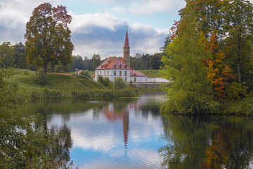 Obraz premium Ancient suburban Priorat Palace in the autumn landscape. Gatchina. Leningrad region, Russia