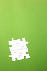 concept of connection in a group. working relationship or friendship, union . white on green background. copy space