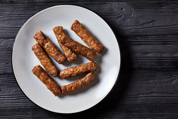 cevapcici, grilled balkan sausages on a plate