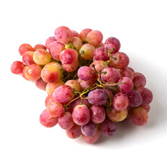 a brush of table pink grapes on a white background