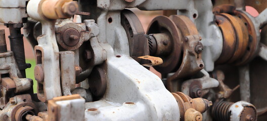 an old machine with rusty gears 