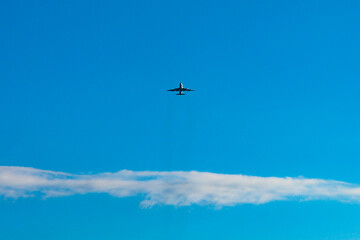 Airplane flying high in the sky