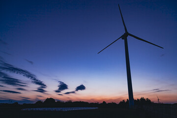 Obraz premium Wind power generation installed in a field in Chiba prefecture