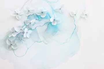 Schilderijen op glas Creative image of pastel blue Hydrangea flowers on artistic ink background. Top view with copy space © tomertu