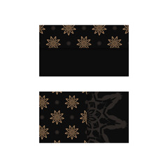 Business card template in black with an abstract brown pattern for your business.