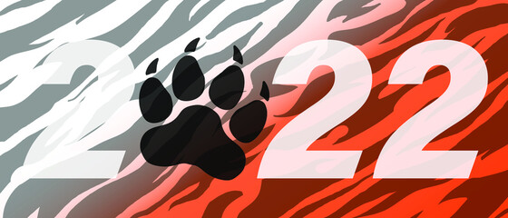 2022 Happy New Year Logo. 2022 with a tiger footprint on tiger skin pattern on background. Year of the tiger minimalistic concept. Vector illustration EPS 10.