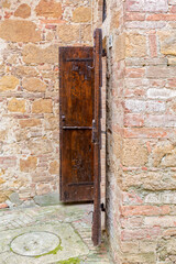 Old weather beaten door to a house