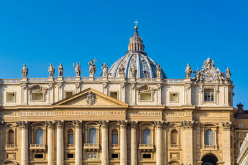 Fototapeta na wymiar A view of main facade and dome of St. Peter's Basilica in the Vatican city, Rome, Italy