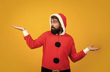 bearded santa man in hat smiling while prepare for celebrating happy new year party and christmas holiday in winter going to have xmas gifts, presenting product