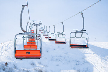 Ski elevator. Funicular in the mountains empty without people. Ski resort.