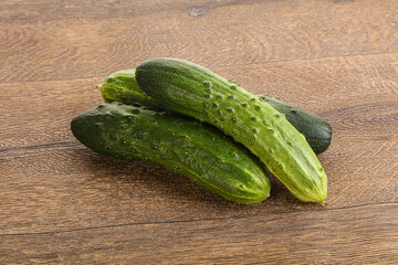 Fersh juicy green cucumbers heap