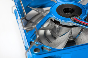 Computer cooler blue with dust on the fan. Isolate on white background.