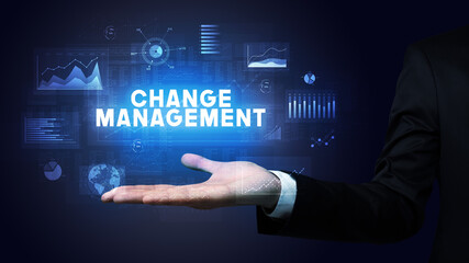 Hand of Businessman holding motivational message