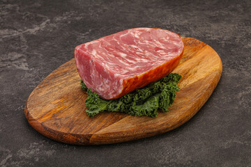 Beef ham piece over board