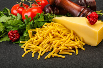 Italian pasta raw Maccheroni for cooking